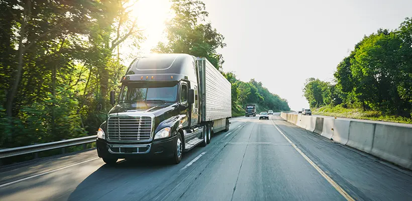 A truck on a highway to represent a case where a truck accident lawyer could be brought in.